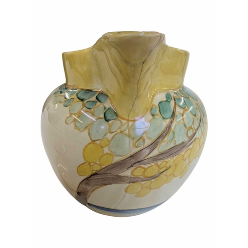 51 - Early 20th century Clarice Cliff pottery jug accompanied by a Paragon tea cup and saucer, and a Crow... 