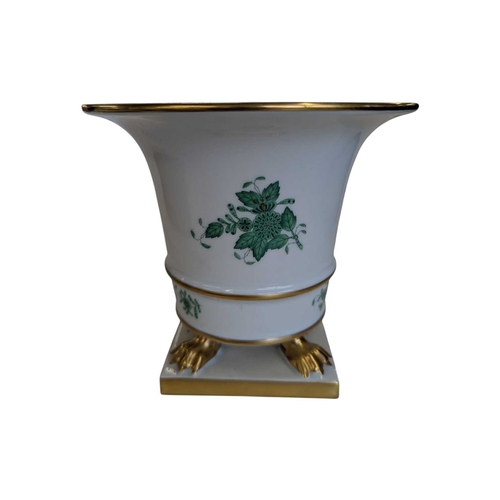 54 - Herend - A 20th century Hungarian Herend Apponyi porcelain vase. Of fluted form with four claw feet ... 