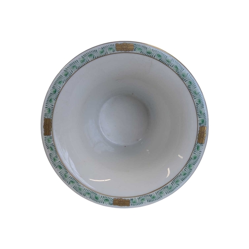 54 - Herend - A 20th century Hungarian Herend Apponyi porcelain vase. Of fluted form with four claw feet ... 