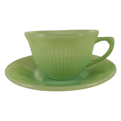 9 - Fire King Ware, U.S.A. - A vintage mid 20th century green glass dinner service / ovenware. Including... 