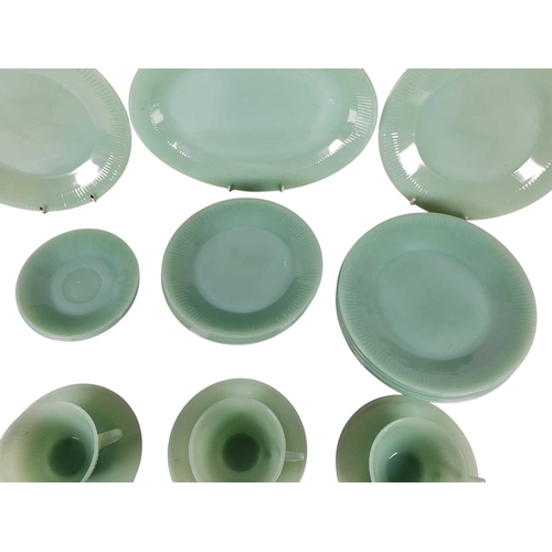 9 - Fire King Ware, U.S.A. - A vintage mid 20th century green glass dinner service / ovenware. Including... 