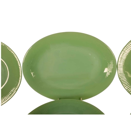 9 - Fire King Ware, U.S.A. - A vintage mid 20th century green glass dinner service / ovenware. Including... 