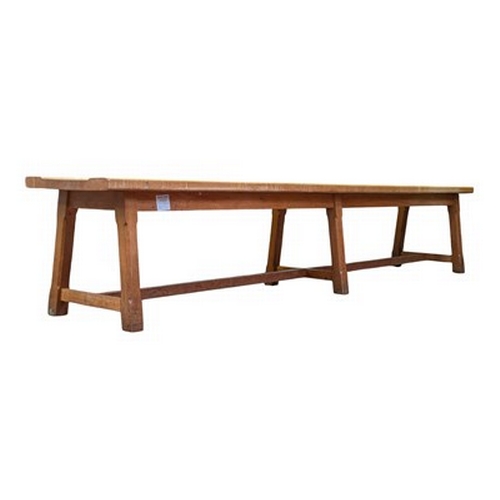 493 - An Arts & Crafts late 19th/early 20th century oak wood farmhouse bench seat. The bench having a ... 
