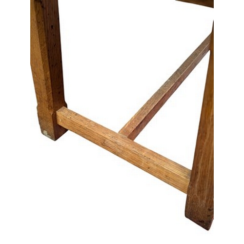 493 - An Arts & Crafts late 19th/early 20th century oak wood farmhouse bench seat. The bench having a ... 