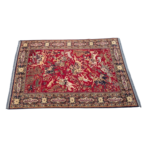 A 20th century 'Lahore' vintage machine made wool rug, the red ground ...