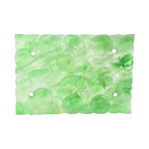 63 - A Chinese carved Jade panel. The panel with carved fruits and flowers. Measures 3.8cm.