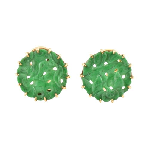 68 - A pair of French 18ct gold and carved jade panel ear clips. The earrings with pierced and carved rou... 