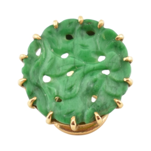 68 - A pair of French 18ct gold and carved jade panel ear clips. The earrings with pierced and carved rou... 