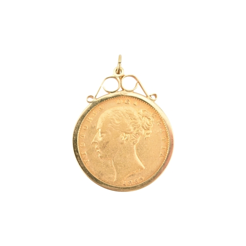 71 - A 9ct gold mounted Victoria 1869 young head shield back full gold sovereign, die No 4 necklace penda... 