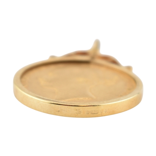 71 - A 9ct gold mounted Victoria 1869 young head shield back full gold sovereign, die No 4 necklace penda... 