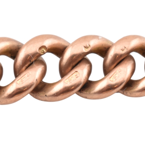 74 - An early 20th century hallmark 9ct gold Albert watch chain strung with a 1912 gold sovereign, togeth... 