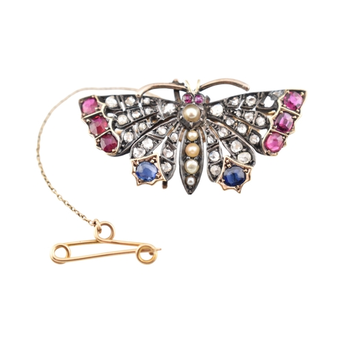 75 - A Victorian 19th century gold, ruby, sapphire, split pearl and diamond cluster set butterfly brooch.... 