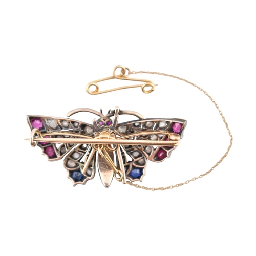 75 - A Victorian 19th century gold, ruby, sapphire, split pearl and diamond cluster set butterfly brooch.... 