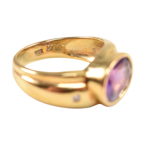 76 - A Kai Yin Lo 18ct gold amethyst and diamond ring. Stamped 750 KYLO 65. Weight 6.9g. Size M.