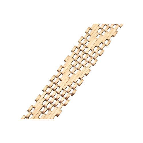 79 - A hallmarked 9ct gold fancy link bracelet with heart clasp padlock. Hallmarked London. Weight 8.3g. ... 