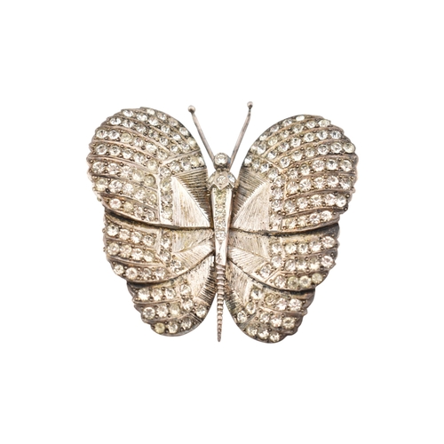 82 - An Art Deco silver paste set butterfly brooch pin. Weight 28g. Measures 5cm.