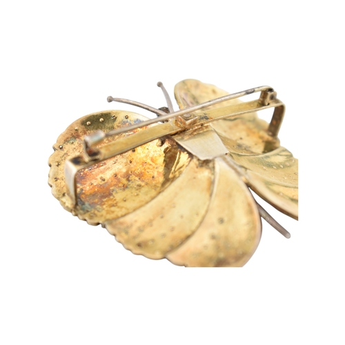 82 - An Art Deco silver paste set butterfly brooch pin. Weight 28g. Measures 5cm.