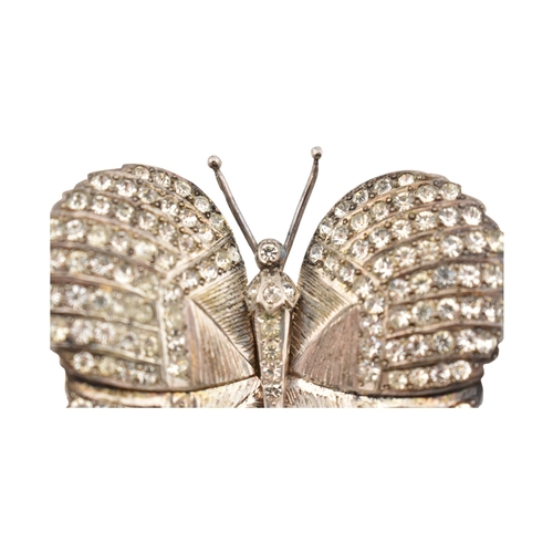 82 - An Art Deco silver paste set butterfly brooch pin. Weight 28g. Measures 5cm.