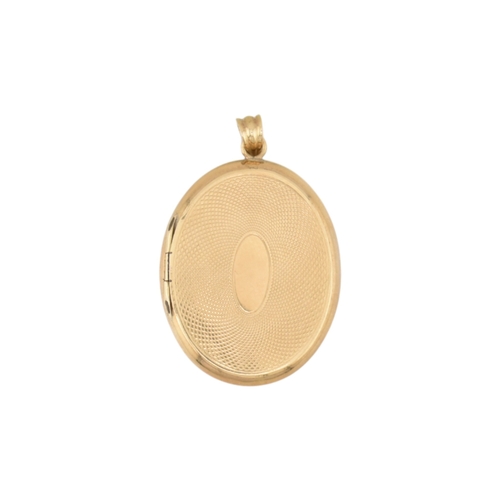 83 - An Austro-Hungarian gold enamel locket pendant. The locket with enamel decoration having engine turn... 