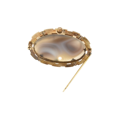 84 - An early 20th century yellow metal and agate brooch pin. Weight 22.4g. Measures 5.5cm. Unmarked surf... 