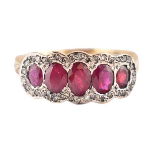 86 - A hallmarked 18ct gold ruby and diamond five stone cluster ring. Hallmarked Sheffield. Weight 5.3g. ... 