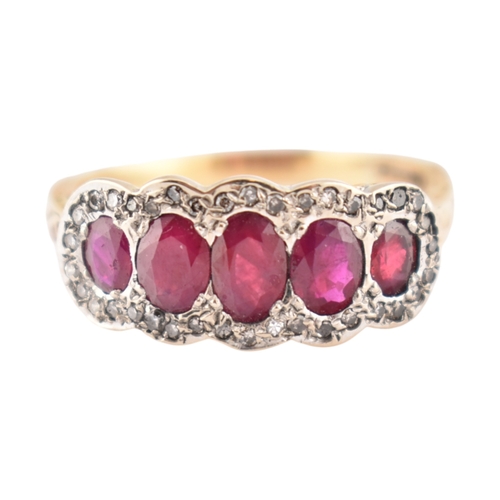 86 - A hallmarked 18ct gold ruby and diamond five stone cluster ring. Hallmarked Sheffield. Weight 5.3g. ... 