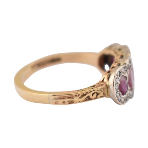 86 - A hallmarked 18ct gold ruby and diamond five stone cluster ring. Hallmarked Sheffield. Weight 5.3g. ... 