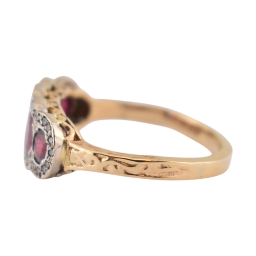 86 - A hallmarked 18ct gold ruby and diamond five stone cluster ring. Hallmarked Sheffield. Weight 5.3g. ... 