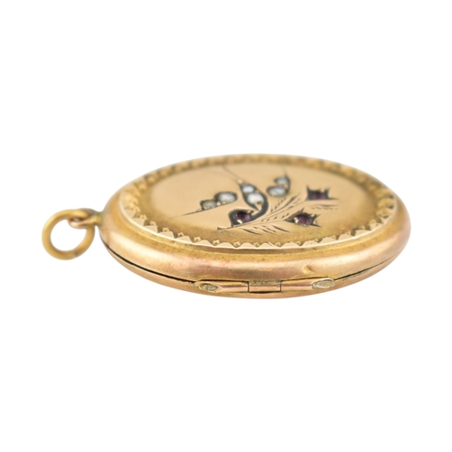 88 - A Victorian 9ct gold back and front locket with pearl and amethyst swallow decoration. Marked silver... 