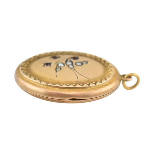 88 - A Victorian 9ct gold back and front locket with pearl and amethyst swallow decoration. Marked silver... 