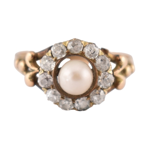90 - An early 20th century pearl and diamond cluster ring. The ring set with a central pearl framed by ol... 