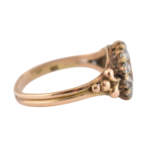 90 - An early 20th century pearl and diamond cluster ring. The ring set with a central pearl framed by ol... 