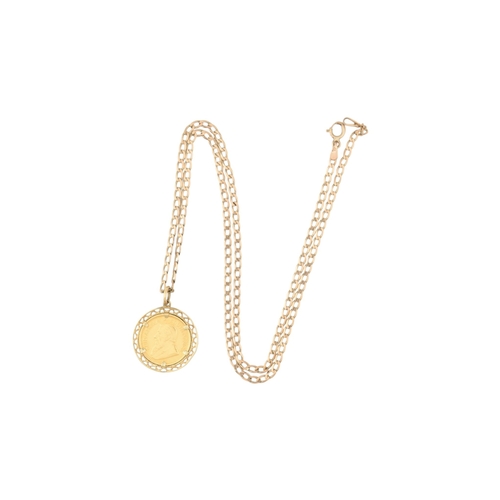 94 - A South African gold one-tenth 1/10 oz Krugerrand 1984 coin inset to a pendant mount and strung upon... 