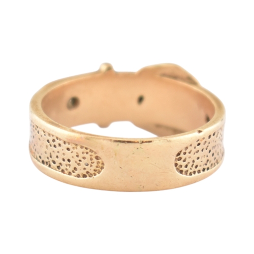 97 - A hallmarked 9ct gold buckle ring. Hallmarked London, sponsors mark T&GJ. Weight 4.8g