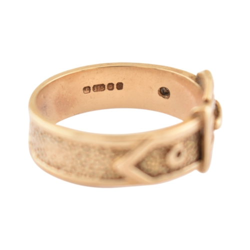97 - A hallmarked 9ct gold buckle ring. Hallmarked London, sponsors mark T&GJ. Weight 4.8g