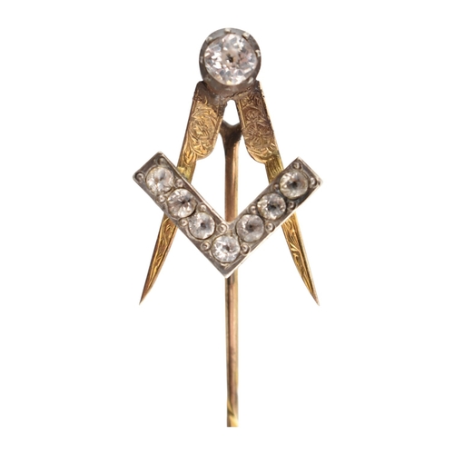 98 - A 19th century gold and paste Masonic stickpin. The stickpin topped with the Masonic square and comp... 