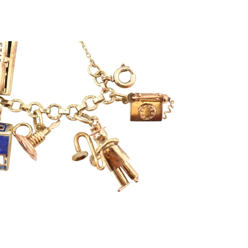 102 - Two Czechoslovakian 14ct gold charm bracelets. The bracelets strung with assorted charms, including ... 