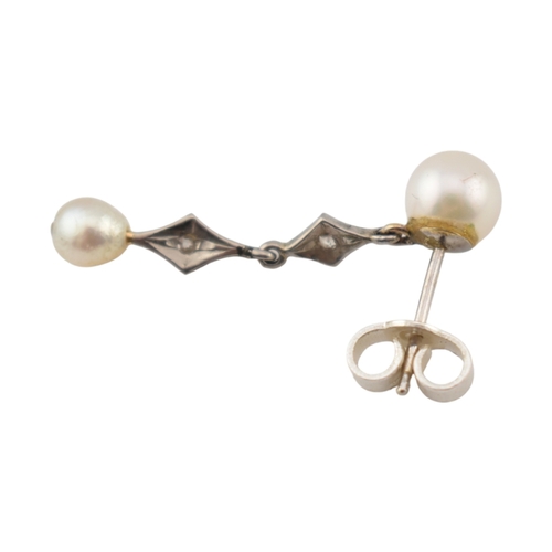 103 - A pair of pearl and diamond pendant earrings. The earrings marked of 18K to posts. Fasteners tests s... 