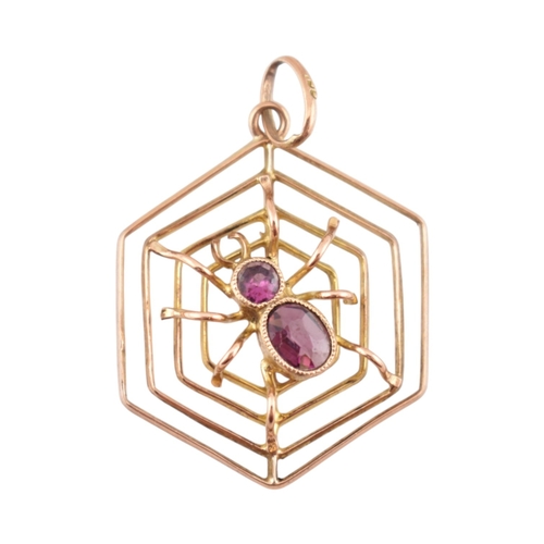 106 - A 9ct gold spider gem set pendant. The pendant marked 9ct. Measures 3cm including bail.