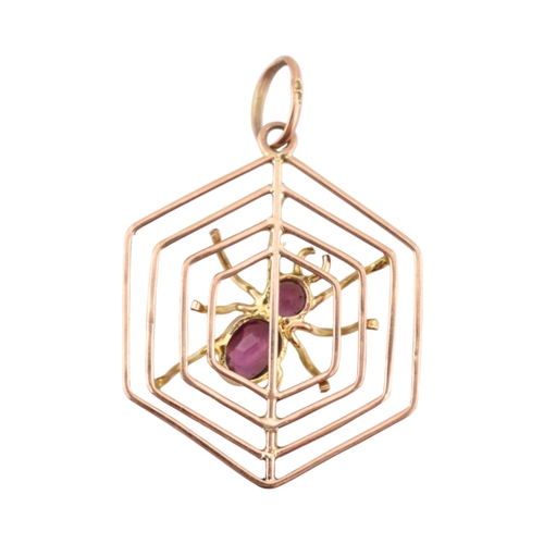106 - A 9ct gold spider gem set pendant. The pendant marked 9ct. Measures 3cm including bail.