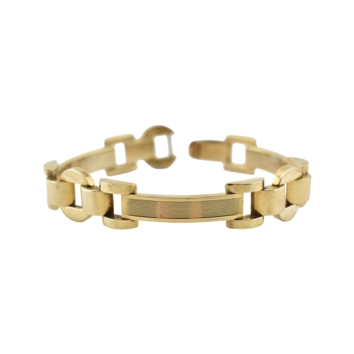 110 - A 14ct gold retro tank bracelet. The bracelet with engine turned and arced and semi-circular links t... 