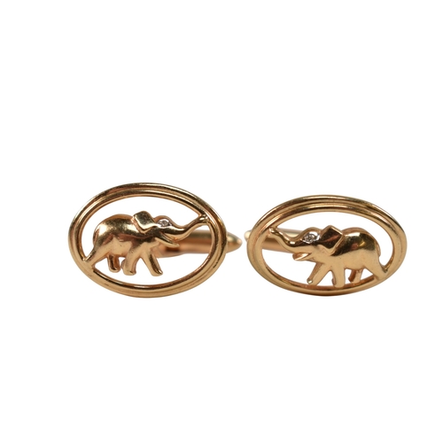 112 - A pair of 14ct gold and diamond novelty elephant cufflinks. Stamped 14K. Weight 9.4g Measures 2.3cm... 