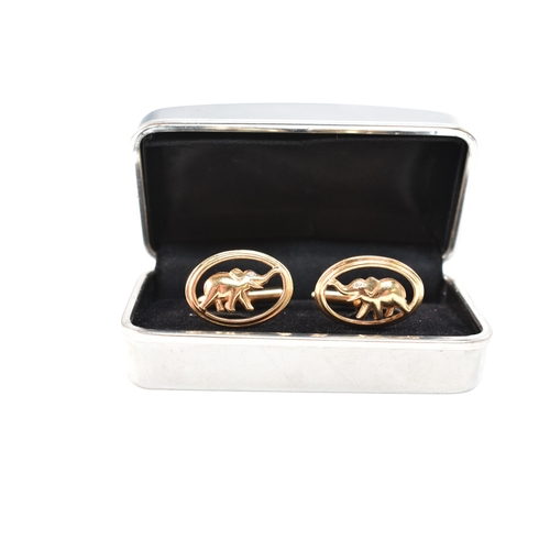 112 - A pair of 14ct gold and diamond novelty elephant cufflinks. Stamped 14K. Weight 9.4g Measures 2.3cm... 