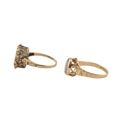 113 - Two hallmarked 9ct gold single stone rings. Each with single quartz / white stones. Hallmarked Londo... 