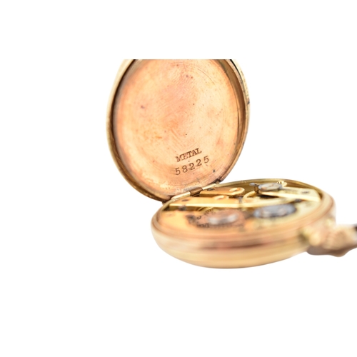 115 - A 14ct gold full hunter fob watch. The watch having floral decorated case, metal movement cover. Whi... 