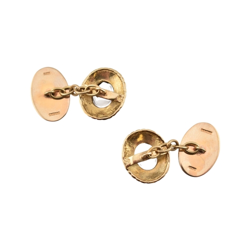 116 - Pair of hallmarked 9ct gold and smoky quartz cufflinks. Weight 7.2g. Measures head 1.6cm. 