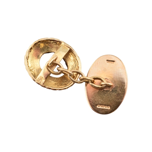 116 - Pair of hallmarked 9ct gold and smoky quartz cufflinks. Weight 7.2g. Measures head 1.6cm. 