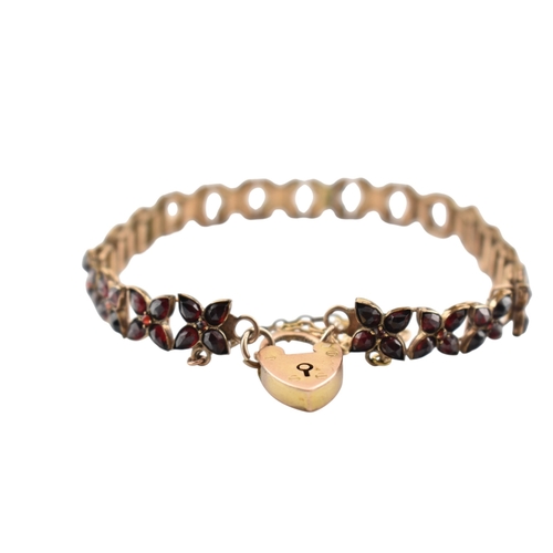 117 - An early 20th century Bohemian garnet bracelet with a hallmarked 9ct gold padlock clasp. The clasp i... 