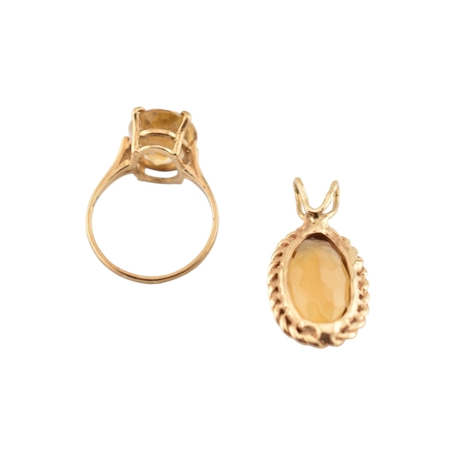 120 - A citrine set necklace pendant and ring. The ring marked 14K. Pendant unmarked tests indicate gold. ... 