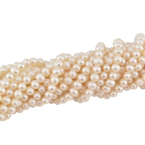 184 - A multistrand pearl necklace with an oversized box clasp. The necklace strung with 18 strands of cul... 